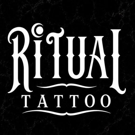 Stylized white typography spelling "Ritual Tattoo" on a black marble background, conveying elegance and artistry.